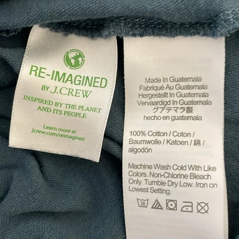 J. Crew washed 100% cotton‎ men’s Size 2XL t-shirt. Color is a dark teal blue.